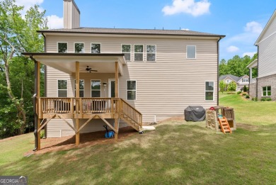 Discover luxury living in this barely lived-in gem nestled in on Traditions of Braselton Golf Club in Georgia - for sale on GolfHomes.com, golf home, golf lot
