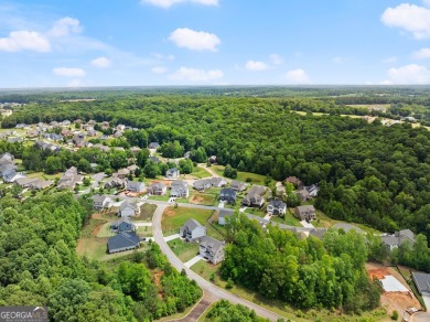 Discover luxury living in this barely lived-in gem nestled in on Traditions of Braselton Golf Club in Georgia - for sale on GolfHomes.com, golf home, golf lot