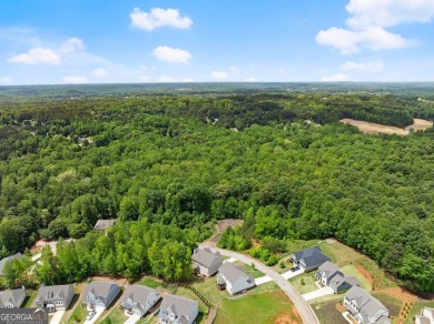 Discover luxury living in this barely lived-in gem nestled in on Traditions of Braselton Golf Club in Georgia - for sale on GolfHomes.com, golf home, golf lot