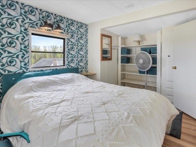 Welcome to your seasonal escape at Apple Island Resort! This on Apple Island Golf Course At Apple Island Resort in Vermont - for sale on GolfHomes.com, golf home, golf lot