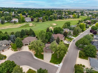 Tucked away on a beautiful professionally landscaped corner on Ptarmigan Golf Course in Colorado - for sale on GolfHomes.com, golf home, golf lot