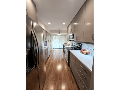 Experience refined living in this beautifully updated 2-bedroom on Old Orchard Country Club in Illinois - for sale on GolfHomes.com, golf home, golf lot