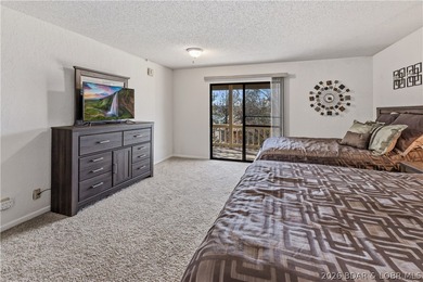 Neighboring Margaritaville Lake Resort, this property delivers on The Oaks Golf Course in Missouri - for sale on GolfHomes.com, golf home, golf lot