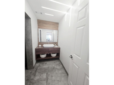 Experience refined living in this beautifully updated 2-bedroom on Old Orchard Country Club in Illinois - for sale on GolfHomes.com, golf home, golf lot