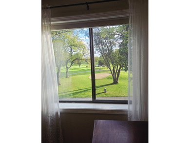 Experience refined living in this beautifully updated 2-bedroom on Old Orchard Country Club in Illinois - for sale on GolfHomes.com, golf home, golf lot