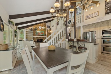 Nestled on the tranquil shores of a private lake, this elegant on Foxcliff Golf Club in Indiana - for sale on GolfHomes.com, golf home, golf lot