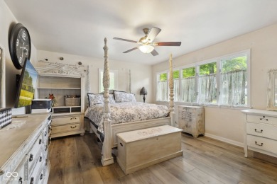 Nestled on the tranquil shores of a private lake, this elegant on Foxcliff Golf Club in Indiana - for sale on GolfHomes.com, golf home, golf lot