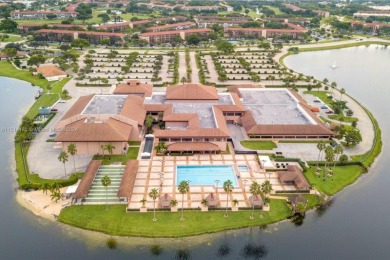 Warm and cozy, very well maintained condo in the large gated on Flamingo Lakes Country Club in Florida - for sale on GolfHomes.com, golf home, golf lot