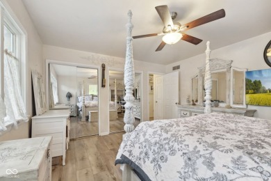 Nestled on the tranquil shores of a private lake, this elegant on Foxcliff Golf Club in Indiana - for sale on GolfHomes.com, golf home, golf lot