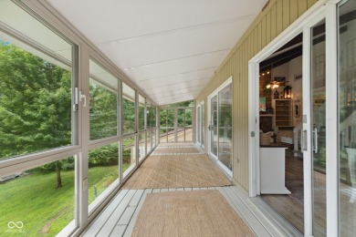 Nestled on the tranquil shores of a private lake, this elegant on Foxcliff Golf Club in Indiana - for sale on GolfHomes.com, golf home, golf lot