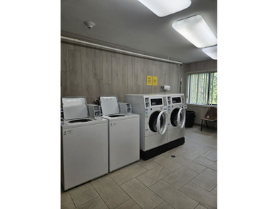 Experience refined living in this beautifully updated 2-bedroom on Old Orchard Country Club in Illinois - for sale on GolfHomes.com, golf home, golf lot
