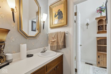 Nestled on the tranquil shores of a private lake, this elegant on Foxcliff Golf Club in Indiana - for sale on GolfHomes.com, golf home, golf lot