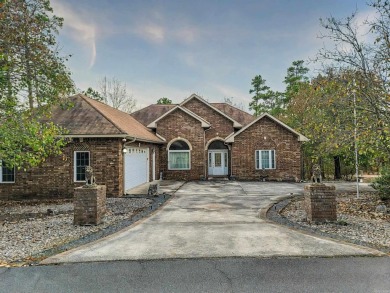 Corner lot means less neighbors. Gravel yard instead of grass on Coronado Golf Course in Arkansas - for sale on GolfHomes.com, golf home, golf lot