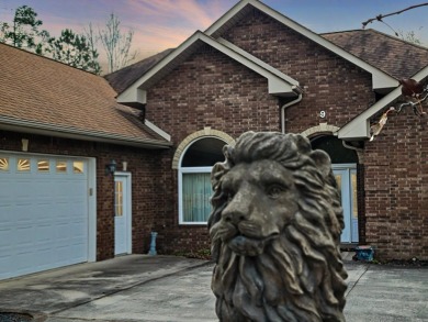 Corner lot means less neighbors. Gravel yard instead of grass on Coronado Golf Course in Arkansas - for sale on GolfHomes.com, golf home, golf lot