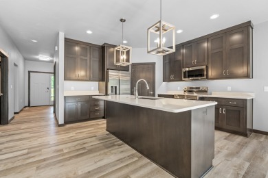 This lovely one-of-a-kind, brand new townhome is a beauty on Cherry Hills Golf Course in Wisconsin - for sale on GolfHomes.com, golf home, golf lot