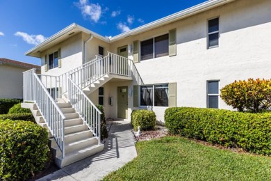 Desirable First Floor condo with a beautiful wide views of the on The Glades Golf and Country Club in Florida - for sale on GolfHomes.com, golf home, golf lot