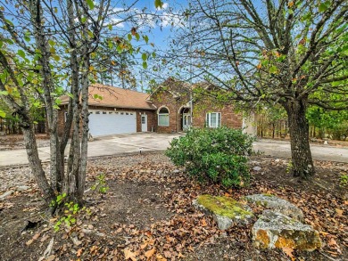 Corner lot means less neighbors. Gravel yard instead of grass on Coronado Golf Course in Arkansas - for sale on GolfHomes.com, golf home, golf lot