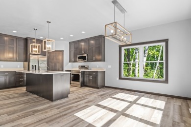 This lovely one-of-a-kind, brand new townhome is a beauty on Cherry Hills Golf Course in Wisconsin - for sale on GolfHomes.com, golf home, golf lot