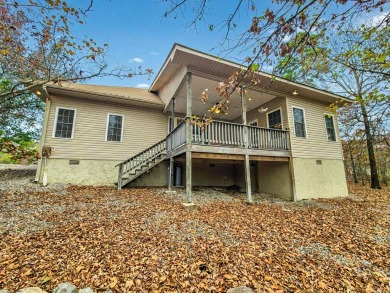 Corner lot means less neighbors. Gravel yard instead of grass on Coronado Golf Course in Arkansas - for sale on GolfHomes.com, golf home, golf lot