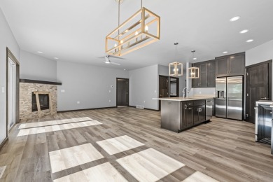 This lovely one-of-a-kind, brand new townhome is a beauty on Cherry Hills Golf Course in Wisconsin - for sale on GolfHomes.com, golf home, golf lot