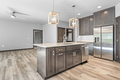 This lovely one-of-a-kind, brand new townhome is a beauty on Cherry Hills Golf Course in Wisconsin - for sale on GolfHomes.com, golf home, golf lot