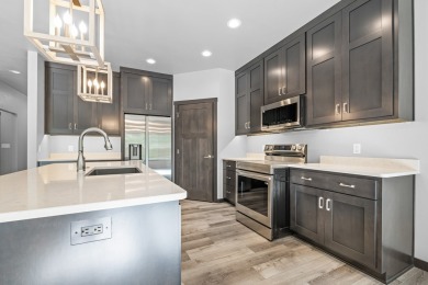 This lovely one-of-a-kind, brand new townhome is a beauty on Cherry Hills Golf Course in Wisconsin - for sale on GolfHomes.com, golf home, golf lot