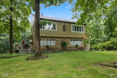 Nestled on the tranquil shores of a private lake, this elegant on Foxcliff Golf Club in Indiana - for sale on GolfHomes.com, golf home, golf lot
