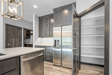 This lovely one-of-a-kind, brand new townhome is a beauty on Cherry Hills Golf Course in Wisconsin - for sale on GolfHomes.com, golf home, golf lot