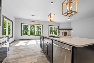 This lovely one-of-a-kind, brand new townhome is a beauty on Cherry Hills Golf Course in Wisconsin - for sale on GolfHomes.com, golf home, golf lot