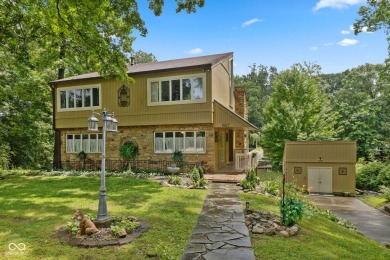 Nestled on the tranquil shores of a private lake, this elegant on Foxcliff Golf Club in Indiana - for sale on GolfHomes.com, golf home, golf lot