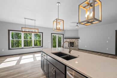 This lovely one-of-a-kind, brand new townhome is a beauty on Cherry Hills Golf Course in Wisconsin - for sale on GolfHomes.com, golf home, golf lot