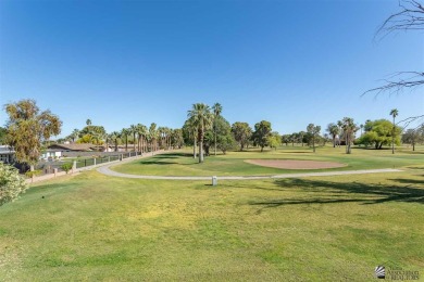 The breath-taking view of the golf course is priceless. This on Yuma Golf and Country Club in Arizona - for sale on GolfHomes.com, golf home, golf lot