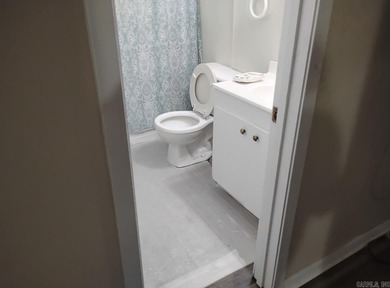 Charming 3-bedroom, 2-bath ranch-style home in the heart of on Cherokee Village North Course in Arkansas - for sale on GolfHomes.com, golf home, golf lot