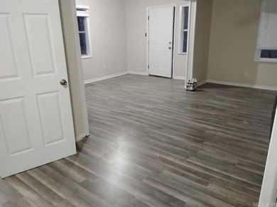 Charming 3-bedroom, 2-bath ranch-style home in the heart of on Cherokee Village North Course in Arkansas - for sale on GolfHomes.com, golf home, golf lot