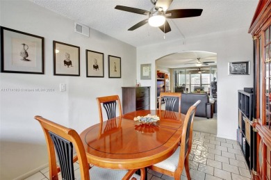 Beautiful 3/2 condo with serene lake and golf course views in on Pine Island Ridge Country Club in Florida - for sale on GolfHomes.com, golf home, golf lot