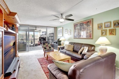 Beautiful 3/2 condo with serene lake and golf course views in on Pine Island Ridge Country Club in Florida - for sale on GolfHomes.com, golf home, golf lot