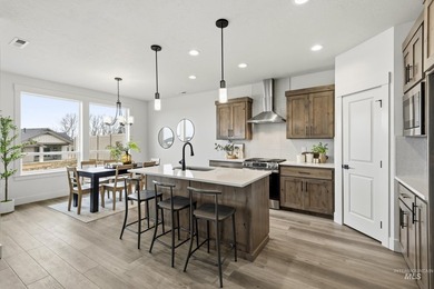 Thoughtfully designed single-level floor plan offers 3 bedrooms on Hunters Point Golf Club in Idaho - for sale on GolfHomes.com, golf home, golf lot