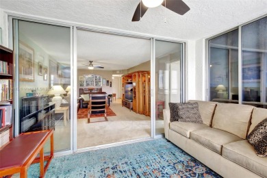 Beautiful 3/2 condo with serene lake and golf course views in on Pine Island Ridge Country Club in Florida - for sale on GolfHomes.com, golf home, golf lot