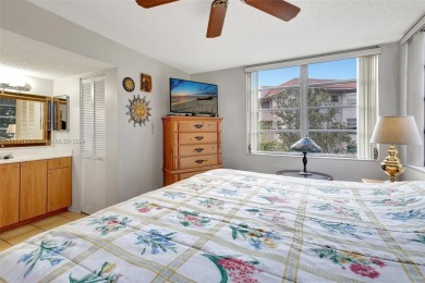 Beautiful 3/2 condo with serene lake and golf course views in on Pine Island Ridge Country Club in Florida - for sale on GolfHomes.com, golf home, golf lot