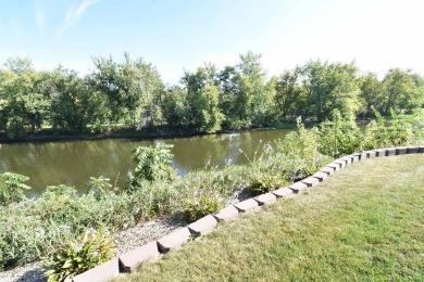 Chalet-style charm meets scenic beauty in this 3-bedroom, 2-bath on River Ridge Golf Club in Iowa - for sale on GolfHomes.com, golf home, golf lot