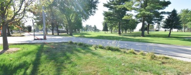 Chalet-style charm meets scenic beauty in this 3-bedroom, 2-bath on River Ridge Golf Club in Iowa - for sale on GolfHomes.com, golf home, golf lot