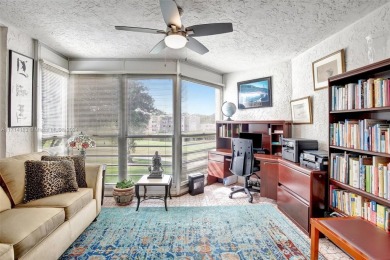 Beautiful 3/2 condo with serene lake and golf course views in on Pine Island Ridge Country Club in Florida - for sale on GolfHomes.com, golf home, golf lot