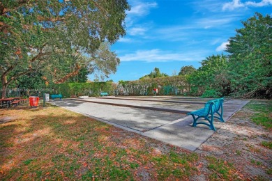 Beautiful 3/2 condo with serene lake and golf course views in on Pine Island Ridge Country Club in Florida - for sale on GolfHomes.com, golf home, golf lot