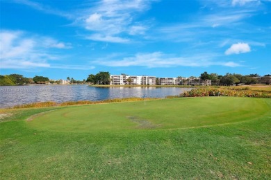 Beautiful 3/2 condo with serene lake and golf course views in on Pine Island Ridge Country Club in Florida - for sale on GolfHomes.com, golf home, golf lot