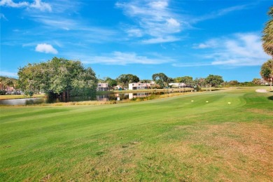 Beautiful 3/2 condo with serene lake and golf course views in on Pine Island Ridge Country Club in Florida - for sale on GolfHomes.com, golf home, golf lot