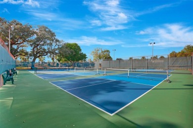 Beautiful 3/2 condo with serene lake and golf course views in on Pine Island Ridge Country Club in Florida - for sale on GolfHomes.com, golf home, golf lot