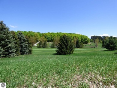 Lovely golf course lot overlooking the 6th fairway of the Summit on Shanty Creek Golf Course in Michigan - for sale on GolfHomes.com, golf home, golf lot