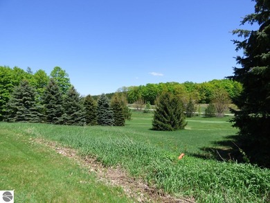 Lovely golf course lot overlooking the 6th fairway of the Summit on Shanty Creek Golf Course in Michigan - for sale on GolfHomes.com, golf home, golf lot