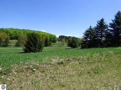 Lovely golf course lot overlooking the 6th fairway of the Summit on Shanty Creek Golf Course in Michigan - for sale on GolfHomes.com, golf home, golf lot