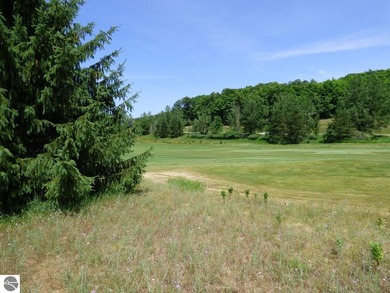Lovely golf course lot overlooking the 6th fairway of the Summit on Shanty Creek Golf Course in Michigan - for sale on GolfHomes.com, golf home, golf lot